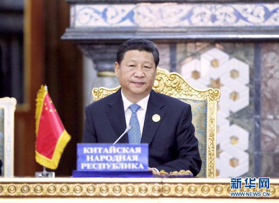 2014年9月12日，上海合作组织成员国元首理事会第十四次会议在塔吉克斯坦首都杜尚别举行。习近平出席会议并发表重要讲话。来源：新华社